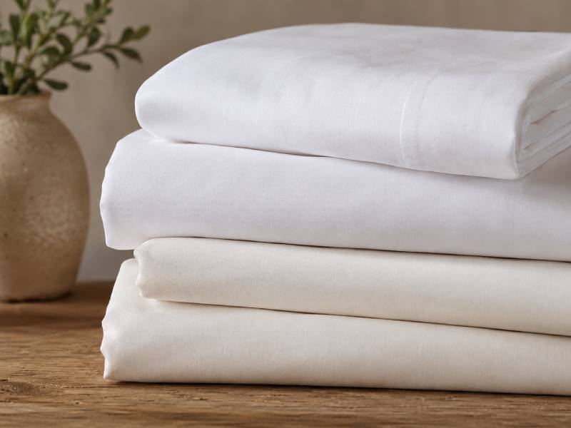 Folded finished bed linen ready for packing
